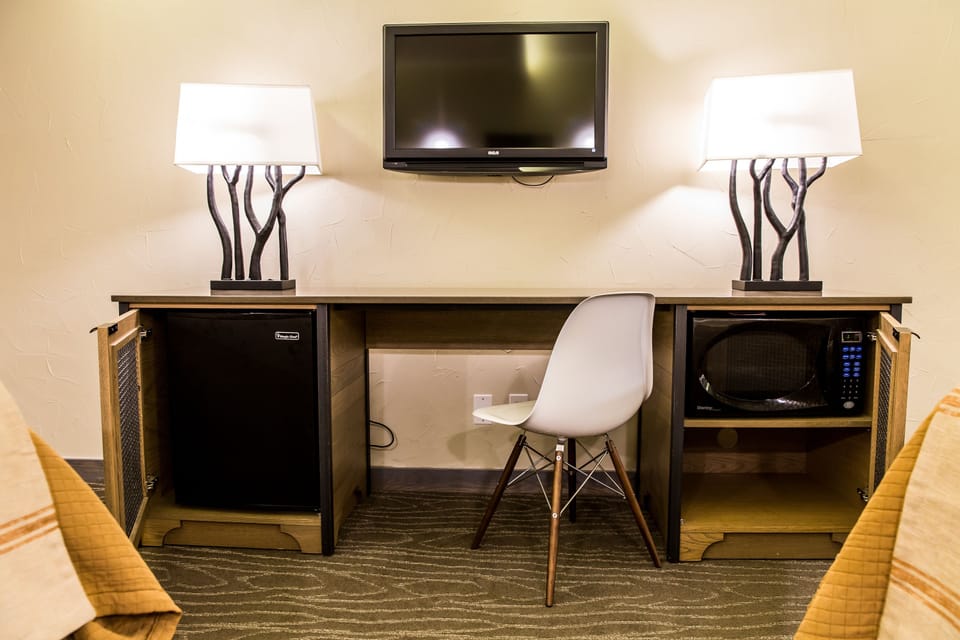 Premium bedding, down comforters, desk, laptop workspace