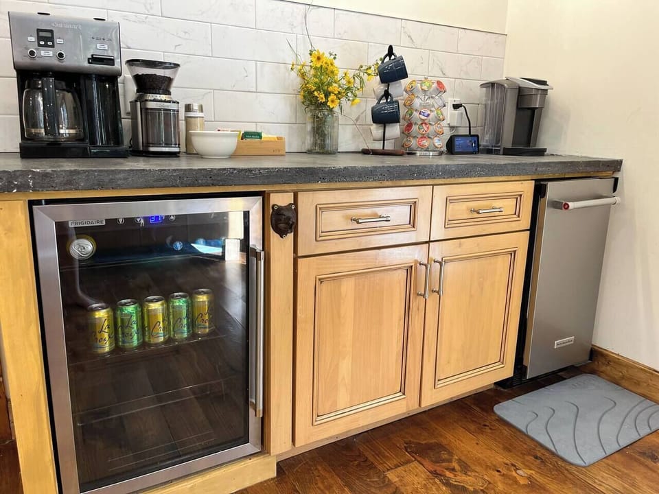 Dedicated ice maker in main level beverage bar! Also included two coffee makers (ground and Keurig) and beverage fridge