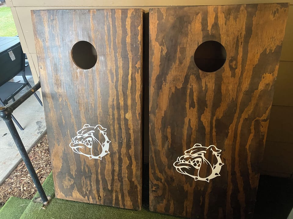 Cornhole set to use in backyard. Go Bullpups!