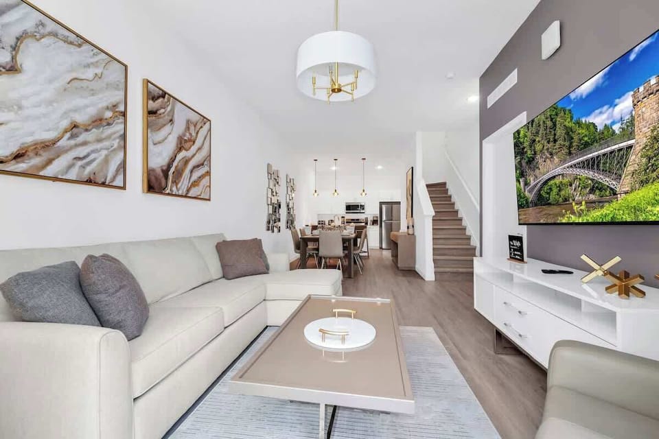 Kick back and relax in this cozy living space with ample seating and a Smart TV for your entertainment.