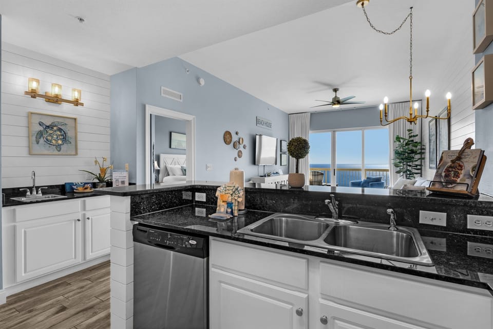 Kitchen - Cook in style in this luxurious gourmet kitchen, complete with state-of-the-art appliances, gorgeous countertops, and every tool for gourmet meals.