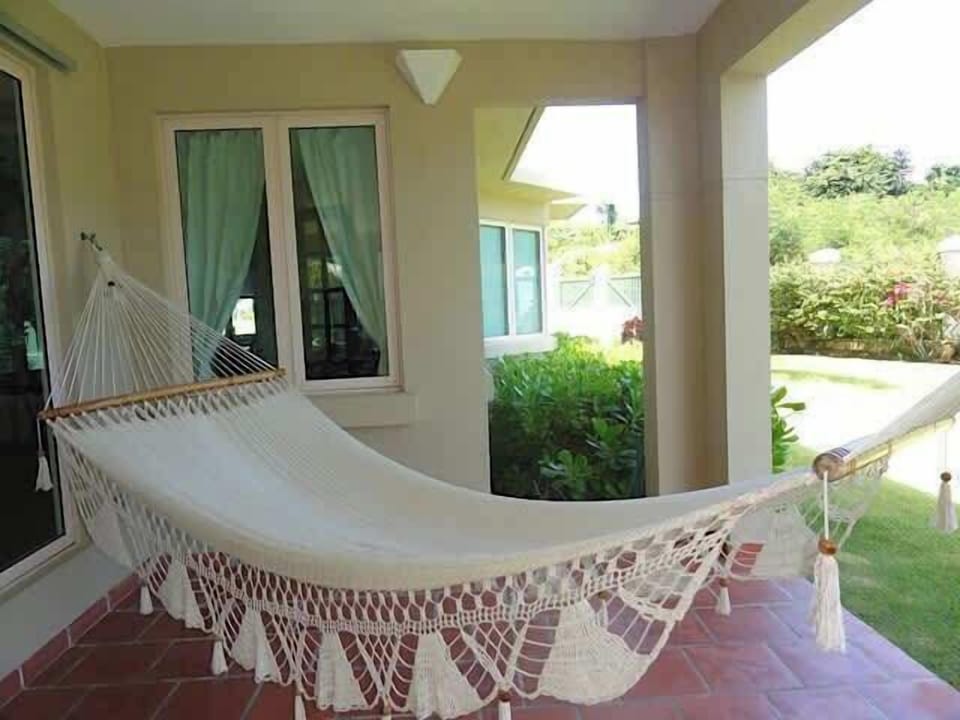 Happy Family ★ ★ ★ ★ ★
The covered patio with hammock and constant breezes was this mom’s favorite perch. 
