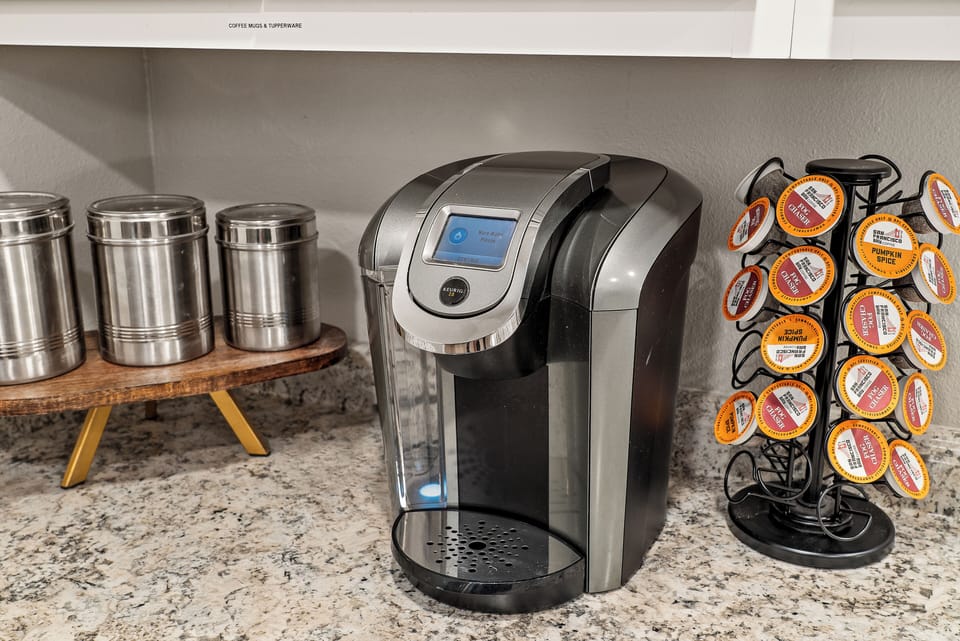 Keurig coffee machine with K cups provided. 