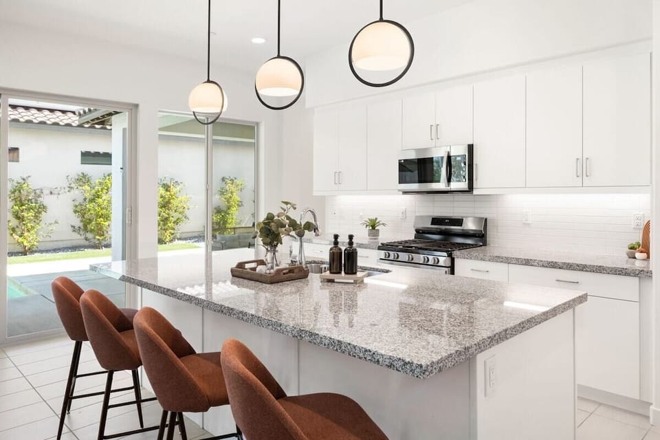 Kitchen island makes it easy to chat while cooking meals together.