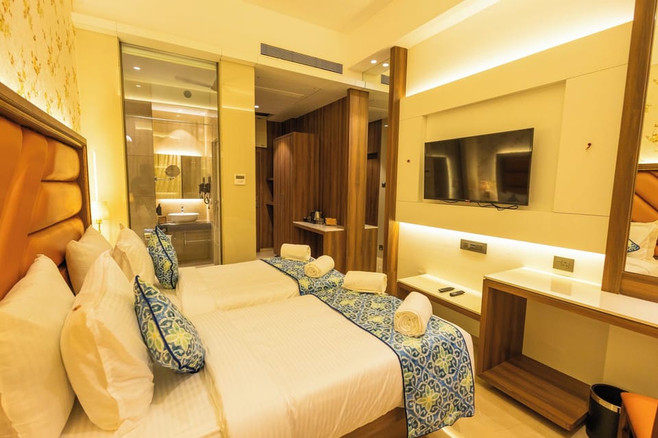 Superior Twin Room | Minibar, in-room safe, iron/ironing board, free WiFi
