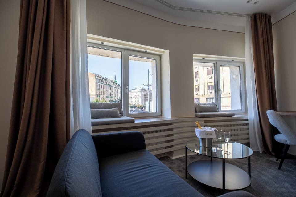 Superior Double or Twin Room | Living area | 52-inch flat-screen TV with cable channels