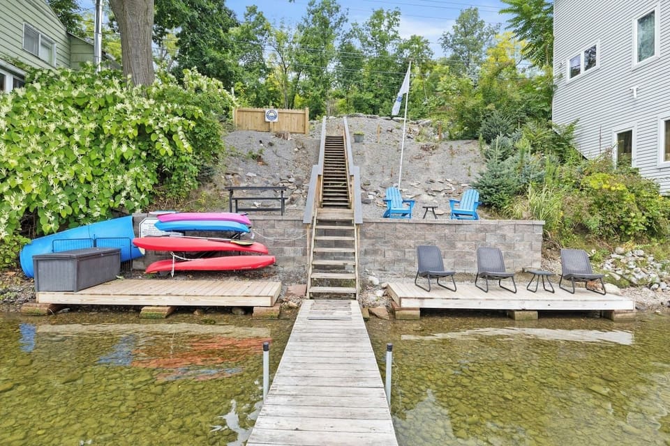 Kamp Kontent - Charming waterfront cottages with direct access to private dock and 42' of lakefront access. The docks provide easy access to boats and water activities.