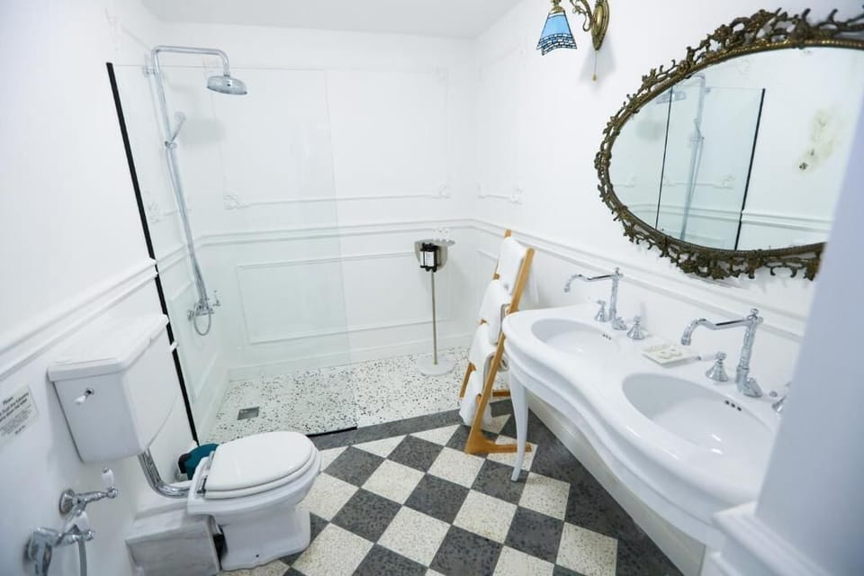 Signature Double Room | Bathroom | Shower, hair dryer, towels, soap