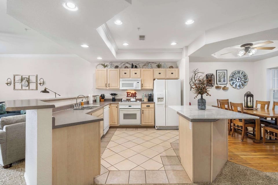 The open, airy kitchen is spacious & offers all the comforts of home