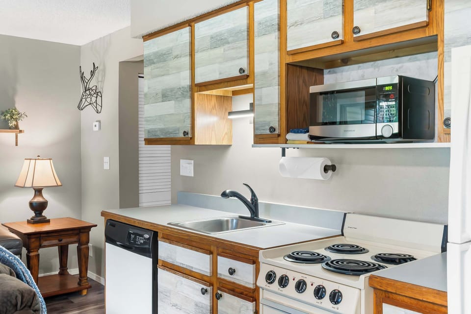 The open, airy kitchen offers ample storage & all the comforts of home