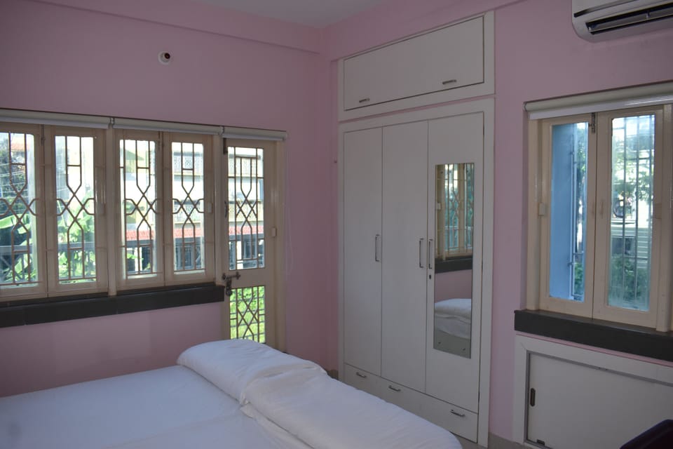 Family Double Room, Balcony, City View | Living area | TV
