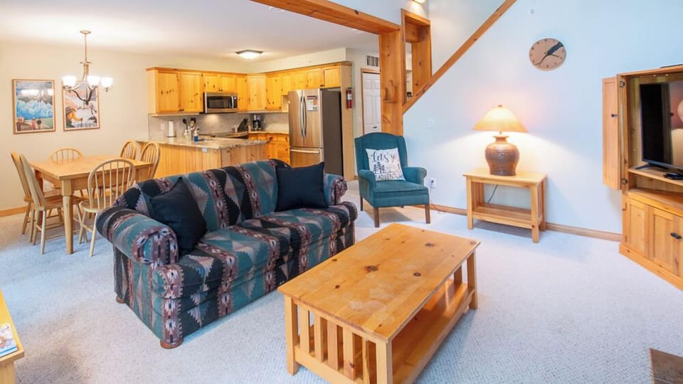 Townhome, Balcony | Living area | 40-inch flat-screen TV with cable channels, fireplace