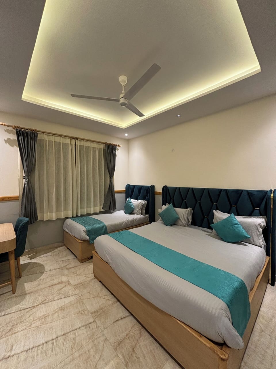 Luxury Triple Room, Park View | Desk, laptop workspace, blackout drapes, iron/ironing board
