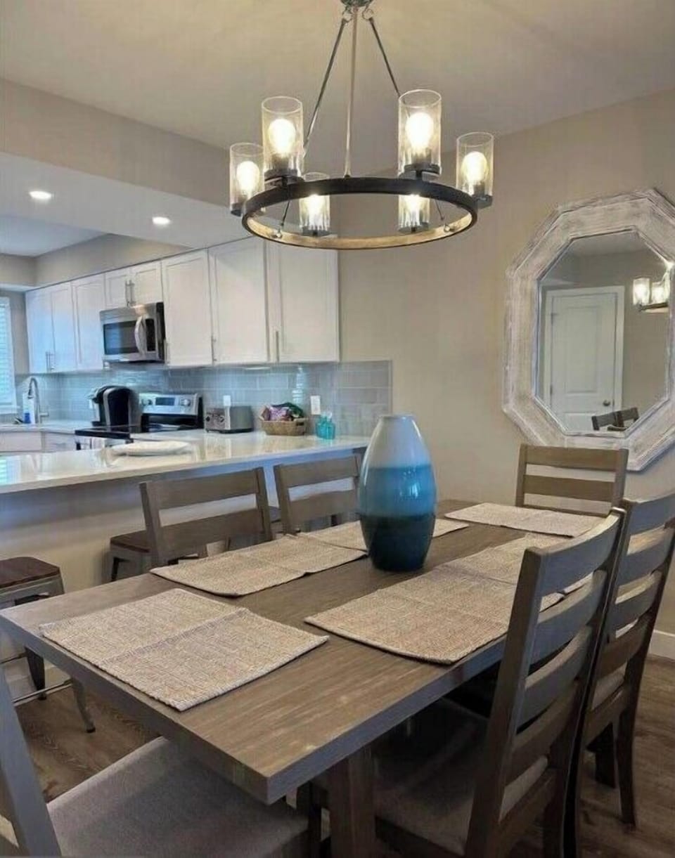 Dining room with counter bar with chairs