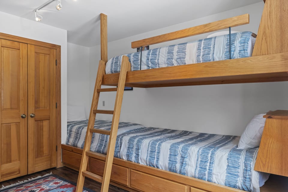 Bedroom 4 - Guest Bedroom - Bunkroom - Entry Level - Twin sized bunk beds and one twin bed