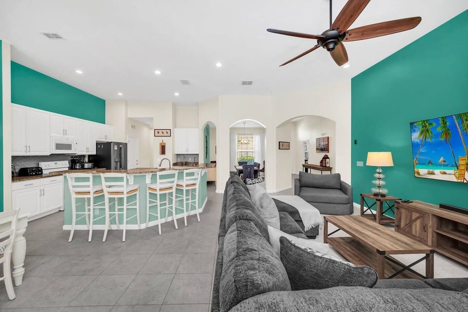Bright, open-concept living space with a fully equipped kitchen and plenty of room for everyone to gather.