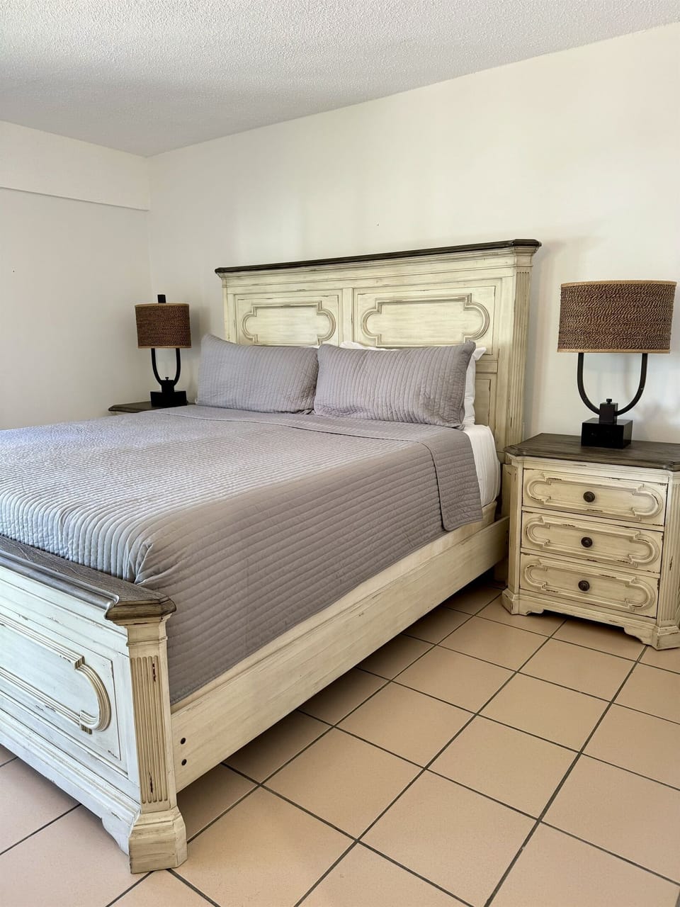Primary bedroom features the king size bed