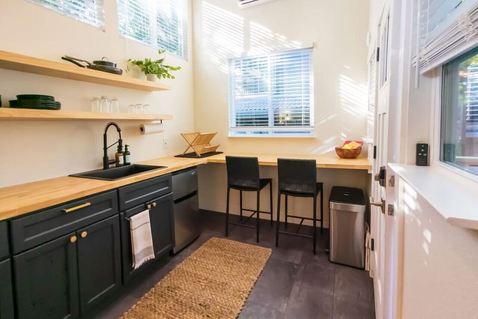 Counter height dining space perfect for a date night or set-up for remote working