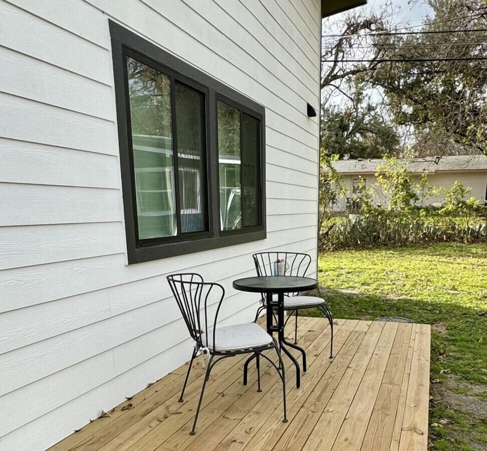 Cute little outdoor deck to enjoy your morning coffee or a drink before heading out!