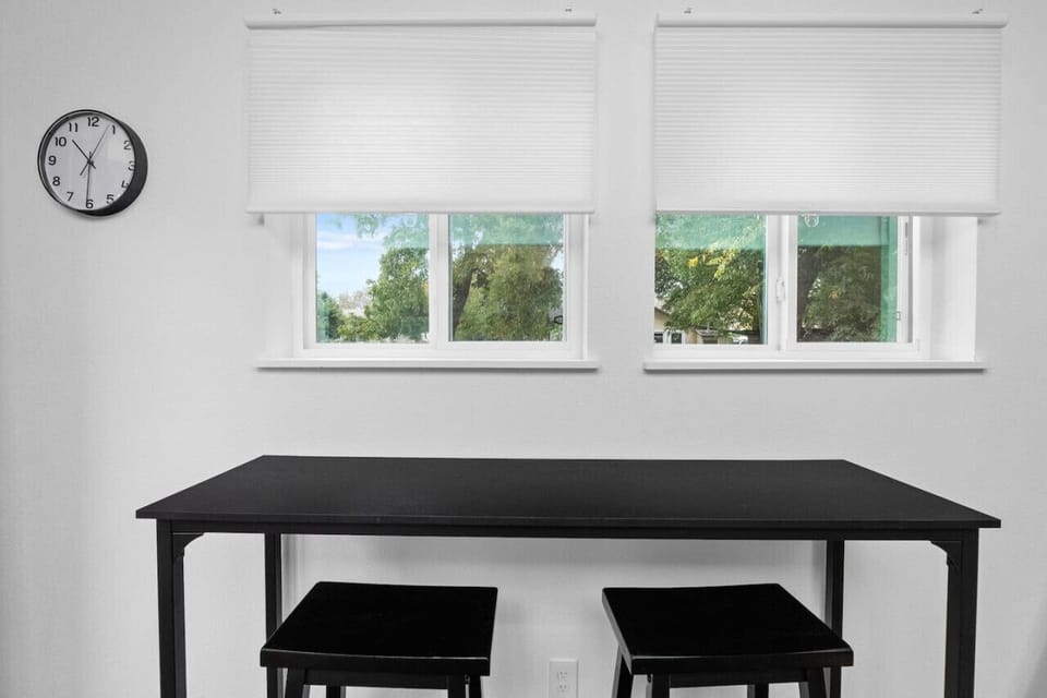 Cellular shades that are easy to operate giving you the option of full natural lighting or soft lighting w/ privacy