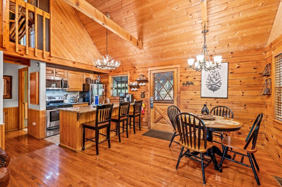 Fully Stocked Kitchen and Dining to comfortably seat 7!