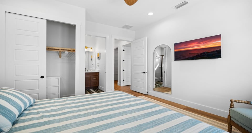 Spacious and thoughtfully laid out for comfort 🛏️
This serene bedroom offers generous storage, a private ensuite, and a calming coastal design—ideal for unwinding and settling in with ease.
