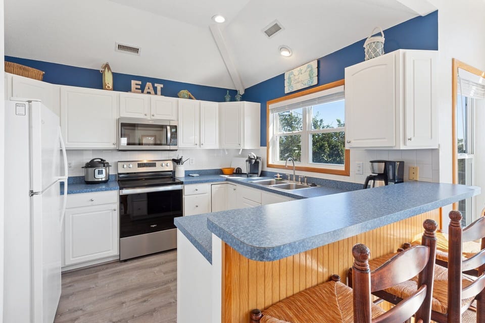 The fully-equipped Kitchen is perfect for preparing a delicious feast that the family can enjoy together.