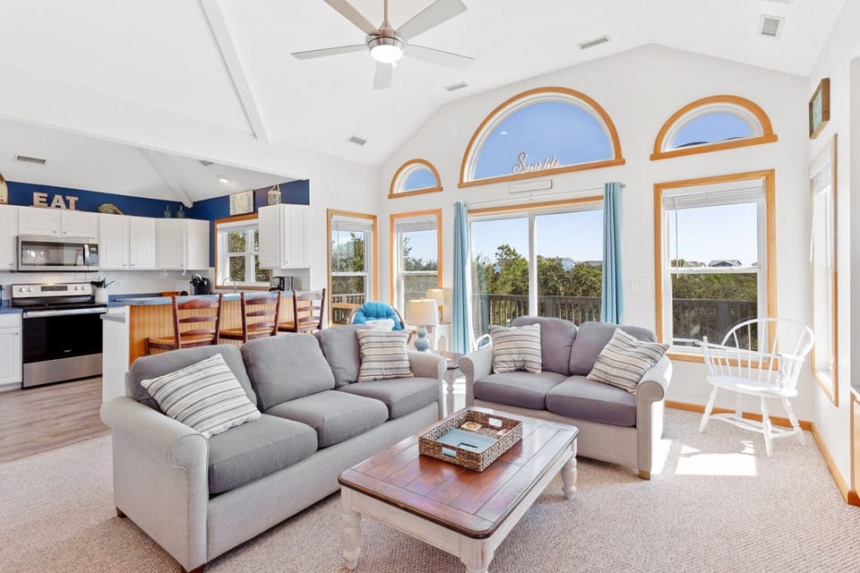 Enjoy family time in the spacious Living Area with a Flat Screen TV and plenty of comfortable seating.