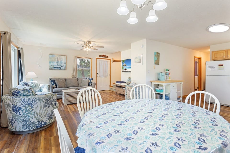 The quaint Dining Area is a perfectly welcoming space to enjoy family meals together after a day exploring the best of the Outer Banks.