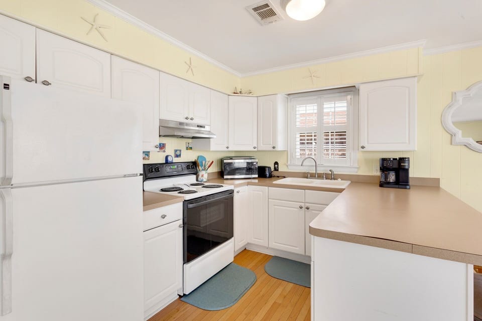 Whip up a delicious meal in the modern Kitchen with all the appliances you need for meal prep!