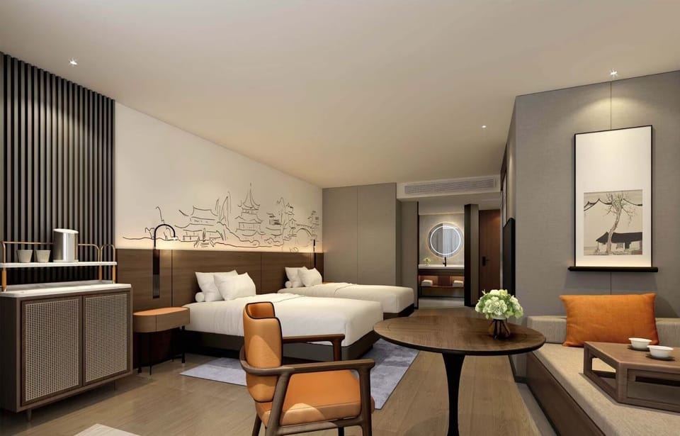 Deluxe Double or Twin Room, City View | In-room safe, desk, laptop workspace, blackout drapes