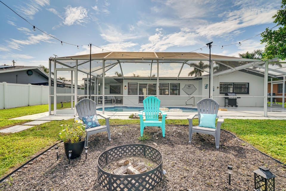 Back Exterior | Fire Pit | Grill | Private Pool | Canal View