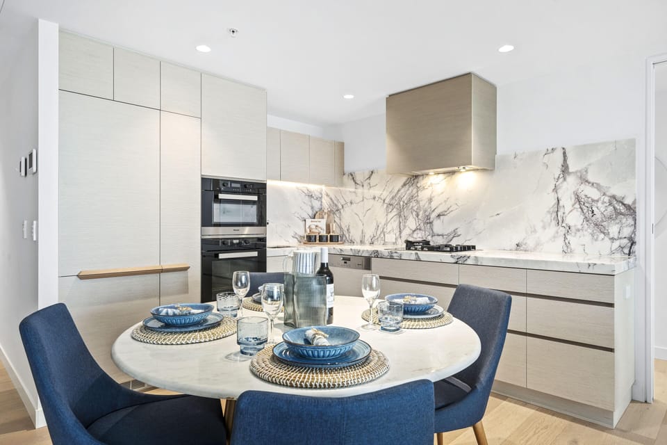 Dining area is right next to the fully equipped modern kitchen