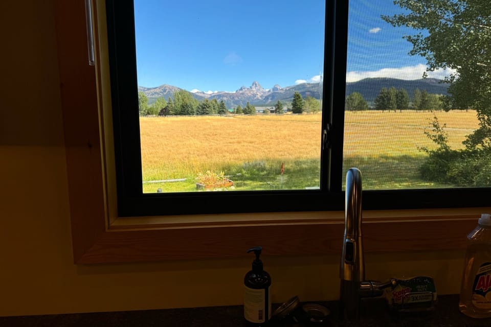 Even the kitchen has a view of those majestic Tetons.