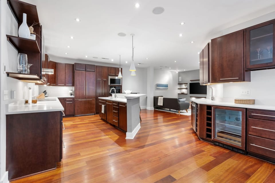 Large Fully Stocked Kitchen w/ Ample Cabinet Space and Wet Bar