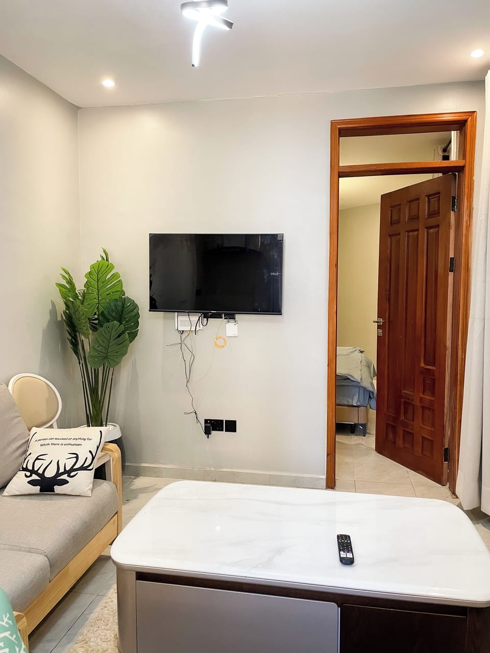 Deluxe Apartment, Balcony, City View | Living area | Flat-screen TV