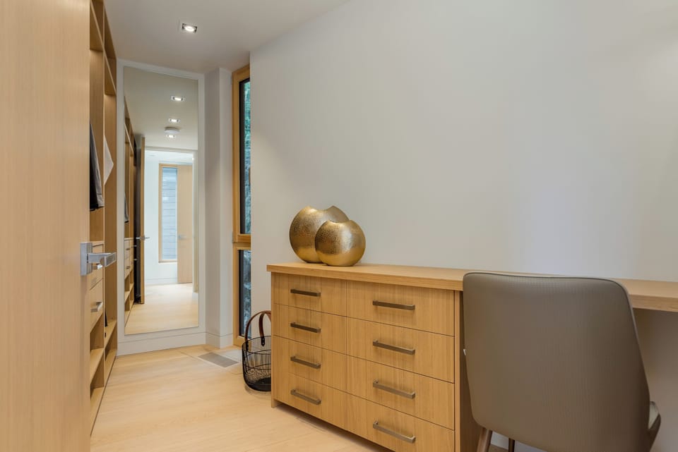 Primary bedroom walk-in closet