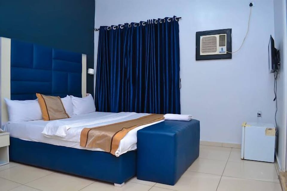 Deluxe Room, Balcony, City View | Desk, laptop workspace, free WiFi