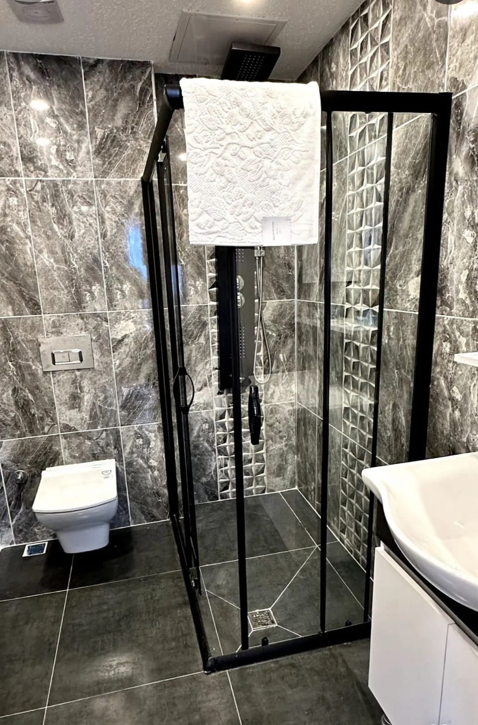 Shower, free toiletries, hair dryer, towels