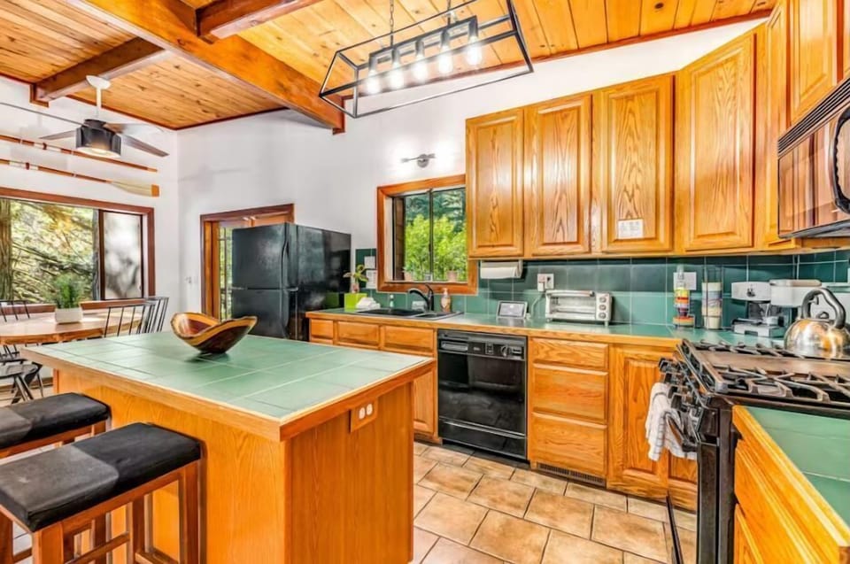 Extra seats and room to help cook at the kitchen island.