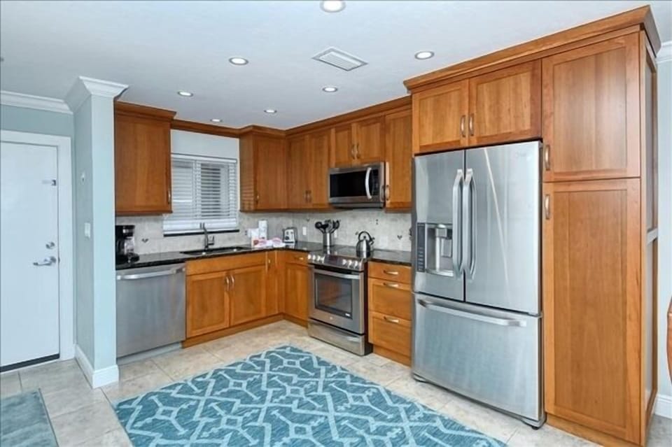 Kitchen - Updated kitchen with stainless steel appliances.