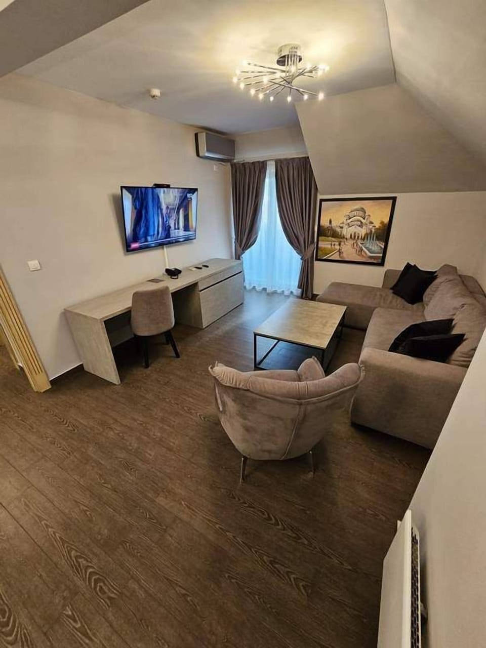 Executive Apartment, Balcony | Living area | TV