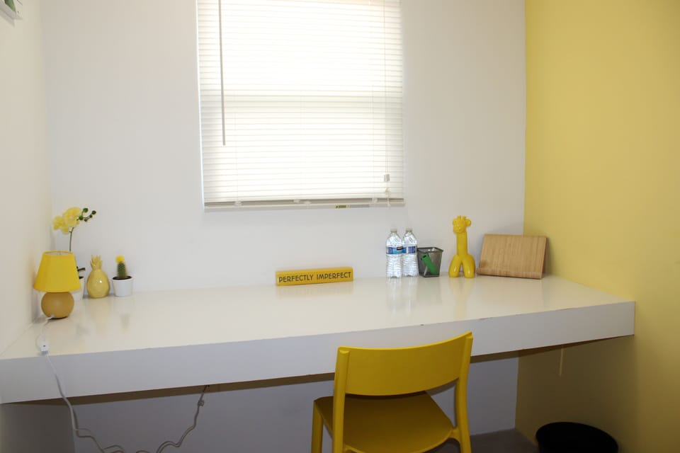 desk area yellow room 