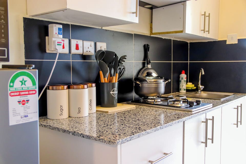 Apartment | Private kitchen | Fridge, microwave, electric kettle, cookware/dishes/utensils