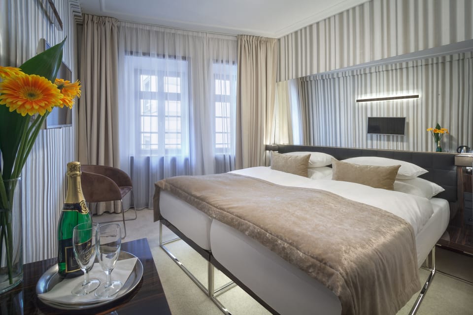 Standard Triple Room | Select Comfort beds, minibar, in-room safe, individually decorated