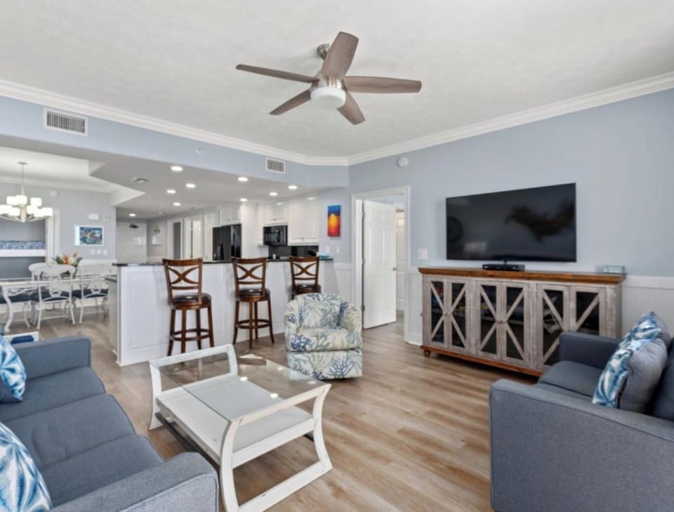 Living area, bar and kitchen