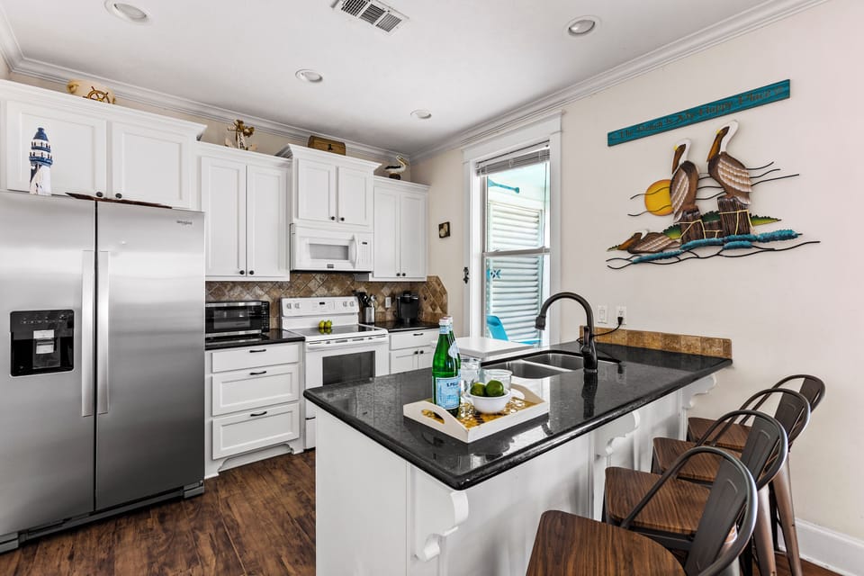 Enjoy a fully stocked kitchen with modern appliances, ready for your favorite meals and snacks.