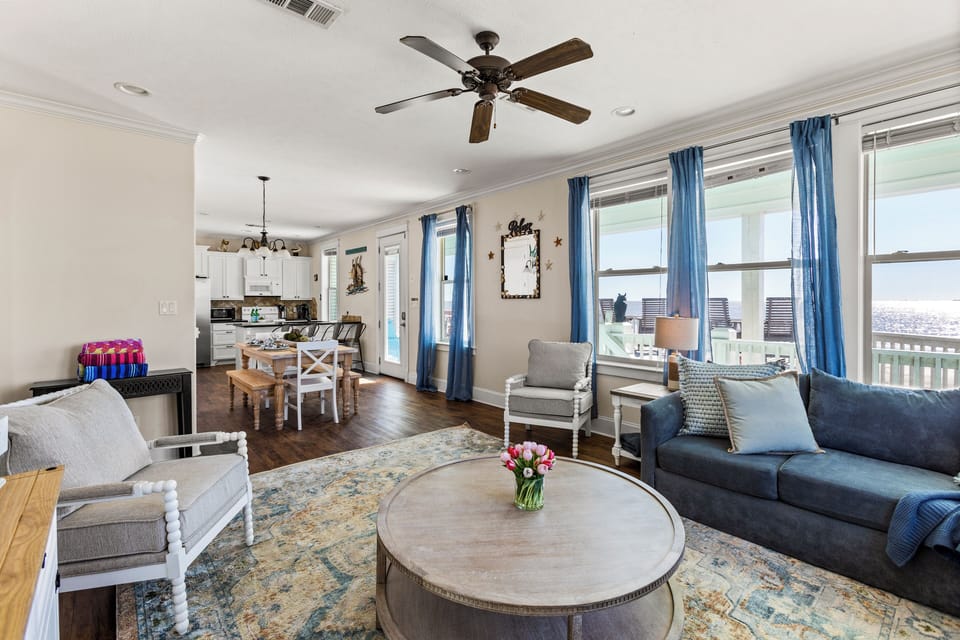 Relax in the inviting open-concept living room, perfect for gatherings with family and friends.
