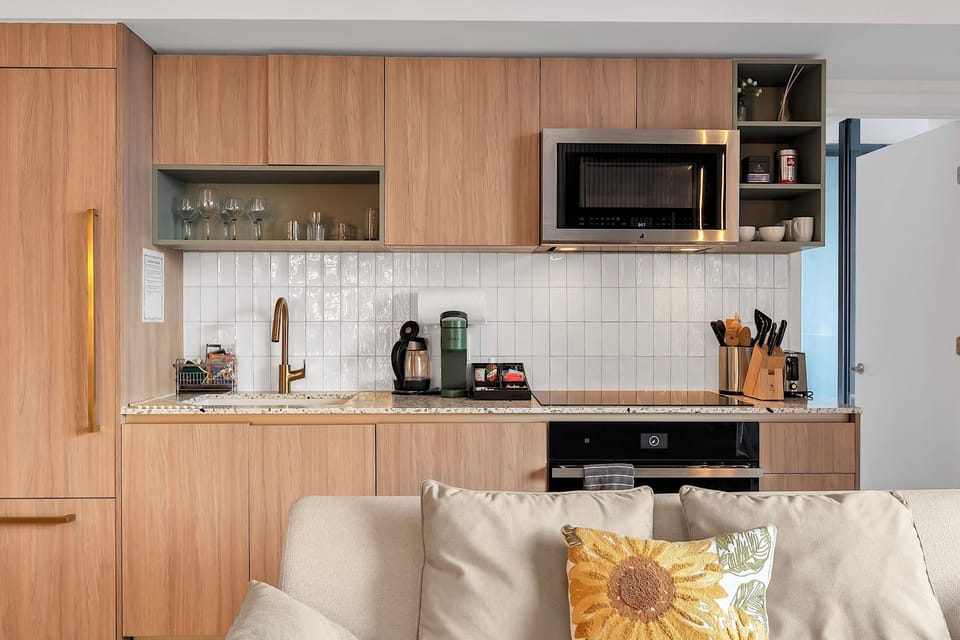 Modern induction cooktop and coffee maker for everyday convenience.