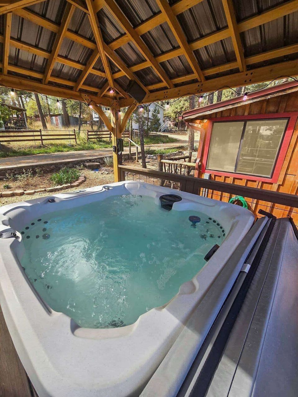Soak your cares away under the stars in your private hot tub retreat.